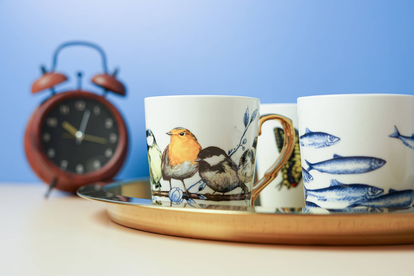 Tasse Bosvogel in Gold