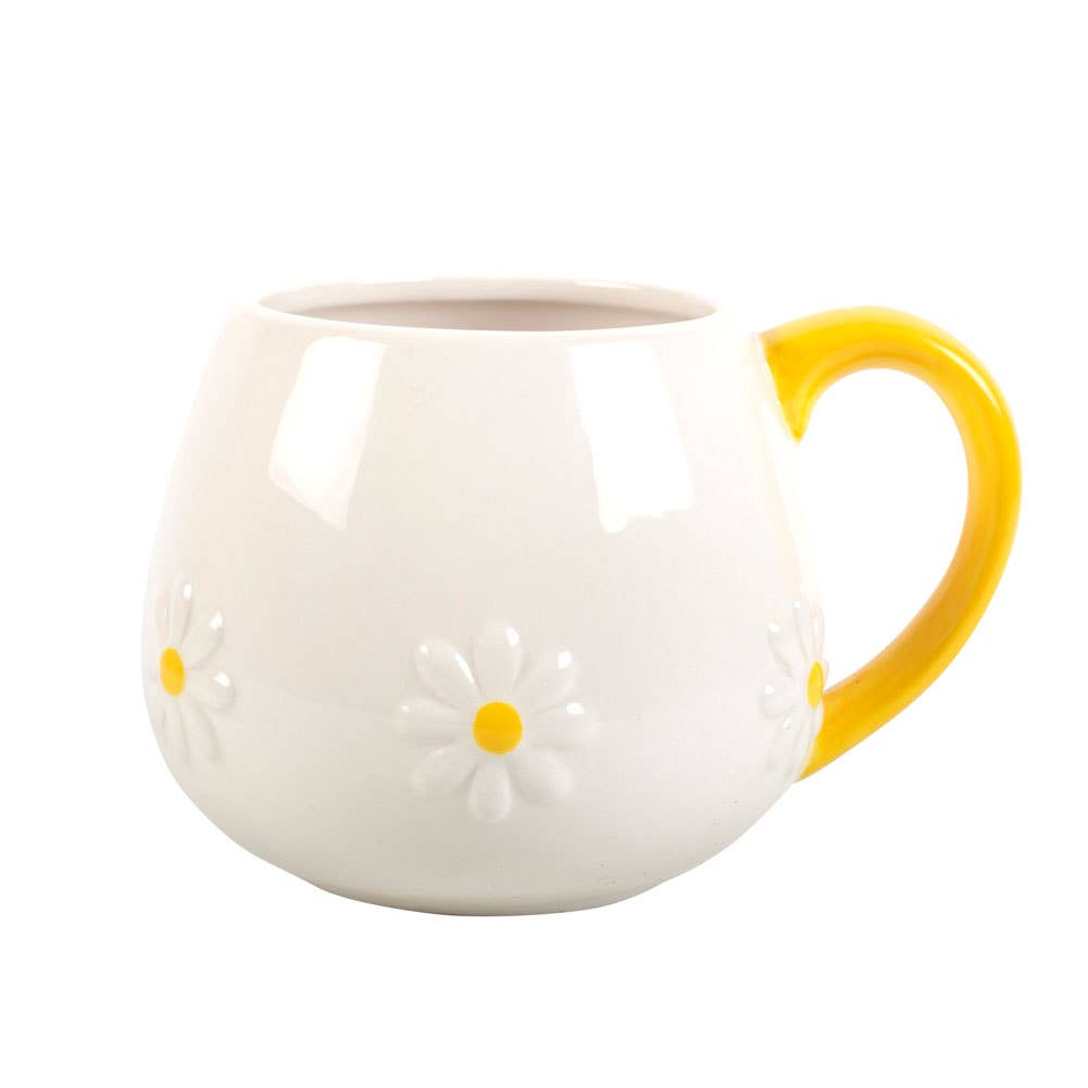 Runde Tasse mit Gänseblümchenblüte