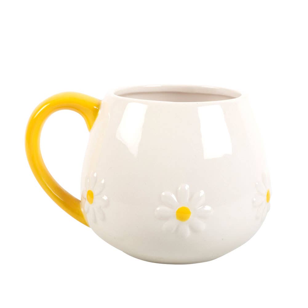 Runde Tasse mit Gänseblümchenblüte