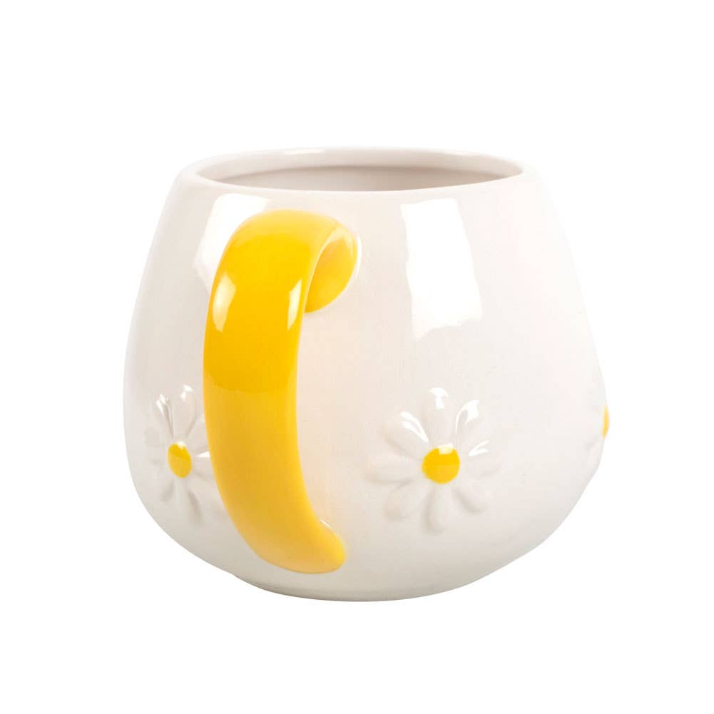Runde Tasse mit Gänseblümchenblüte