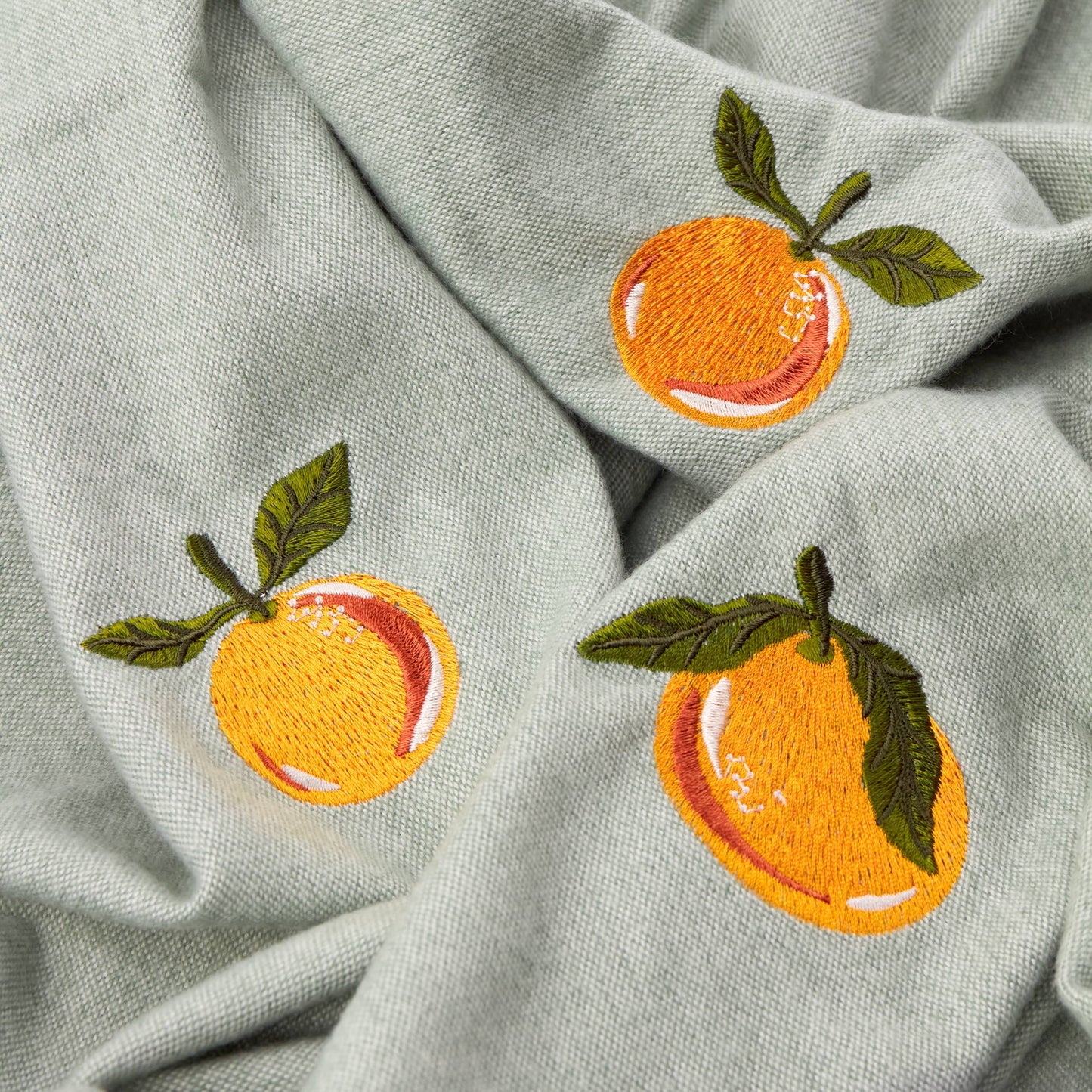 Leichte bestickte Decke: Spritzige Orange