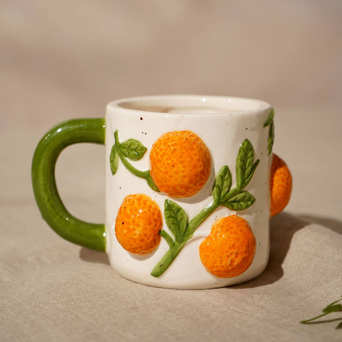 Hestia-Becher mit Orangen